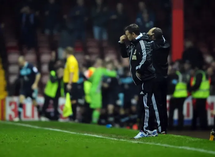 Framed Print : Devastated McInnes Suffers Last-Minute Championship Heartbreak for Bristol City against Burnley