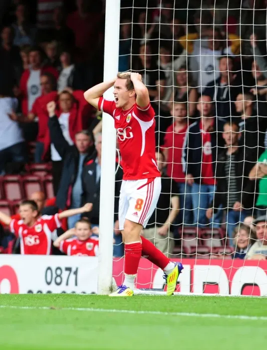 Framed Print : Disallowed Goal: Neil Kilkenny's Frustration at Ashton Gate as Bristol City vs. Portsmouth Championship Match Goal is Disallowed (2008-11)