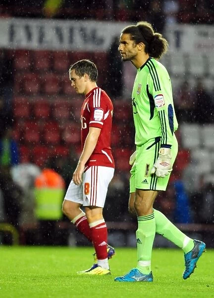 Disappointed David James and Neil Kilkenny Exit Ashton Gate After Bristol City's League Cup Loss to Swindon Town (August 2011)
