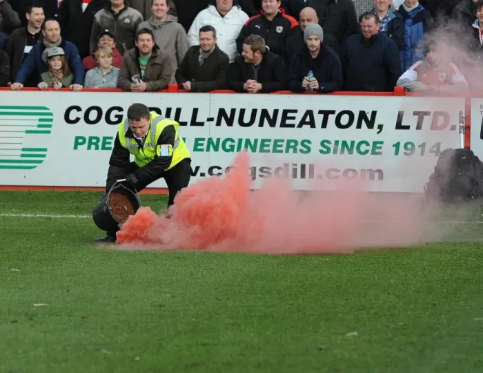 Framed Print : Disruptive Fan Behavior at Tamworth vs. Bristol City FA Cup Match: Stewards Intervene - Football Image