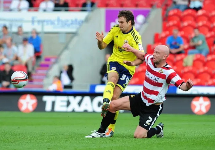 Framed Print : Doncaster Rovers James O'Connor Tackles Brett Pitman of Bristol City - League Cup Clash, 2011 Framed Print : Doncaster Rovers James O'Connor Tackles Brett Pitman of Bristol City - League Cup Clash, 2011