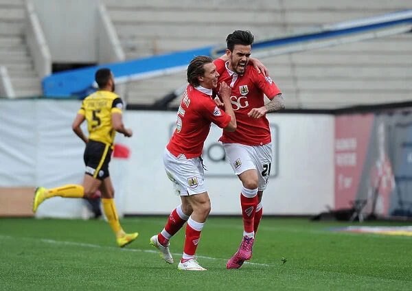 Dynamic Duo: Marlon Pack and Luke Freeman in Unforgettable Goal Celebration for Bristol City against Barnsley (March 2015)