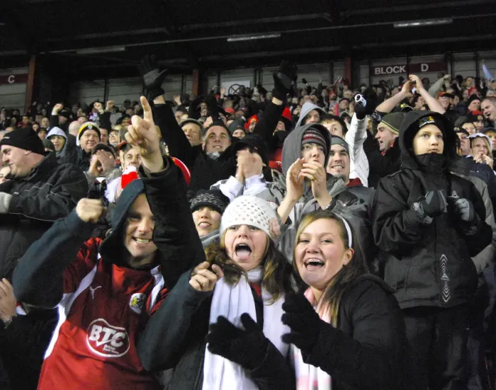 Framed Print : Ecstatic Bristol City Football Club Fans Celebrating a Goal Framed Print : Ecstatic Bristol City Football Club Fans Celebrating a Goal
