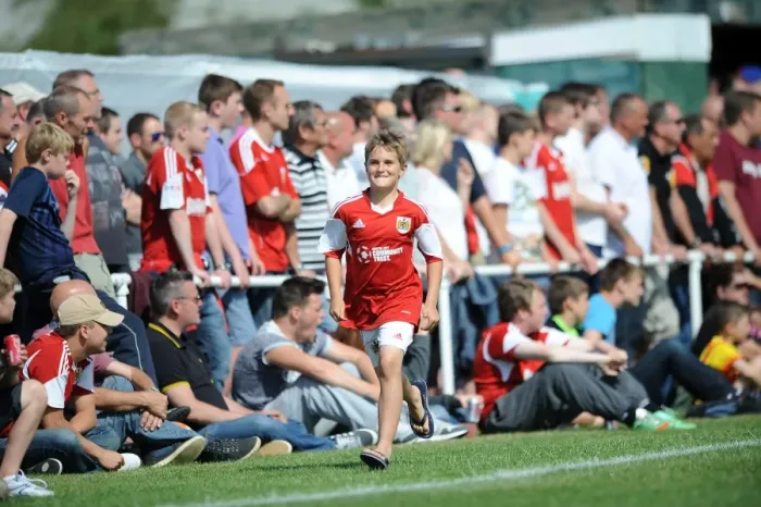 Framed Print : Excited Fan Chases Bristol City Players during Portishead Town Pre-Season Friendly