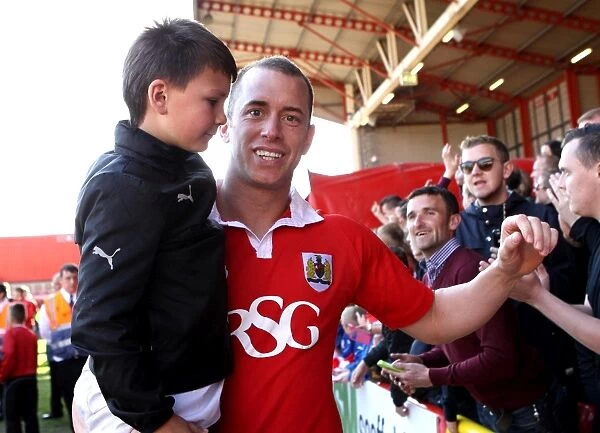 Excited Fan's Joyful Moment with Aaron Wilbraham after Bristol City's Win over Coventry City, 18th April 2015