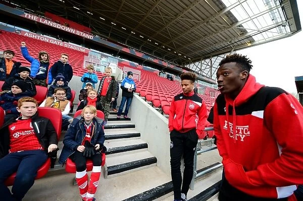 Exciting Encounter: Young Fans Meet Tammy Abraham and Bobby Reid of Bristol City during Sky Bet Championship Match
