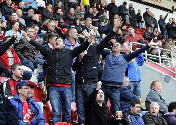 Exultant Moment: Thrilling Goal Celebration by Bristol City Fans at Rotherham United Match, March 2014