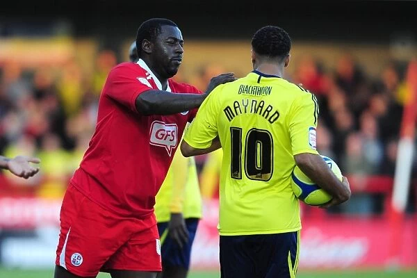 FA Cup: Pablo Mills of Crawley Town Holds Off Nicky Maynard of Bristol City
