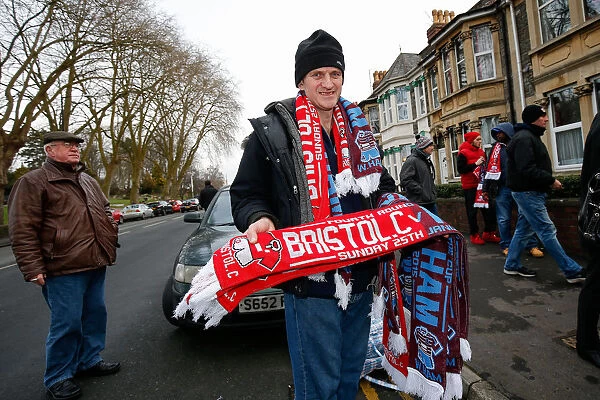 Fan Camaraderie at Ashton Gate: Half and Half Scarves Unite Bristol City and West Ham United Fans during FA Cup Fourth Round
