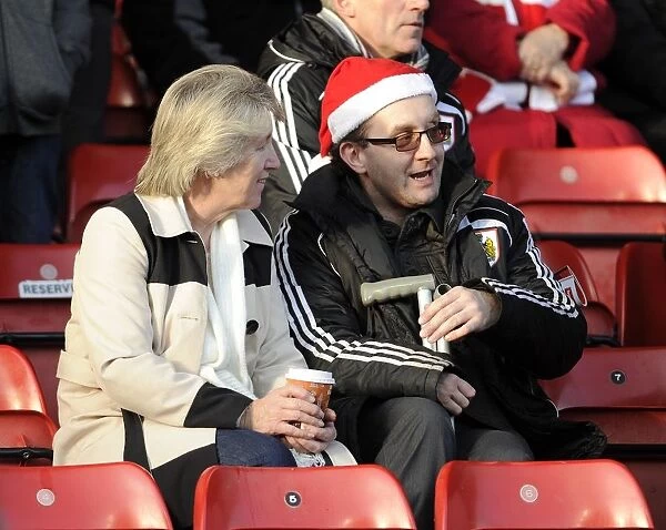 Fan in Christmas Hat Amidst the Cheers: Bristol City vs Walsall, Ashton Gate, 2013