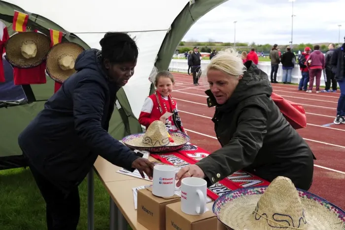 Framed Print : Fan Exploring Bristol Academy Women's Merchandise at Gifford Stadium during BAWFC vs Chelsea Ladies Match