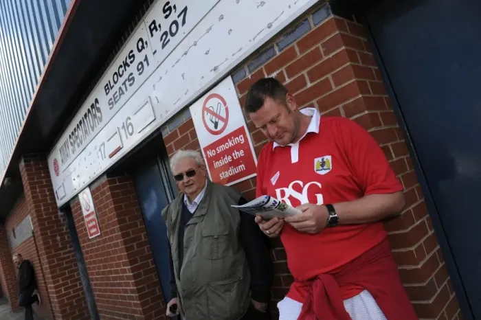 Framed Print : Fan Perusing Programme Outside Spotland Stadium - Rochdale vs. Bristol City Football Match, 2014 Framed Print : Fan Perusing Programme Outside Spotland Stadium - Rochdale vs. Bristol City Football Match, 2014