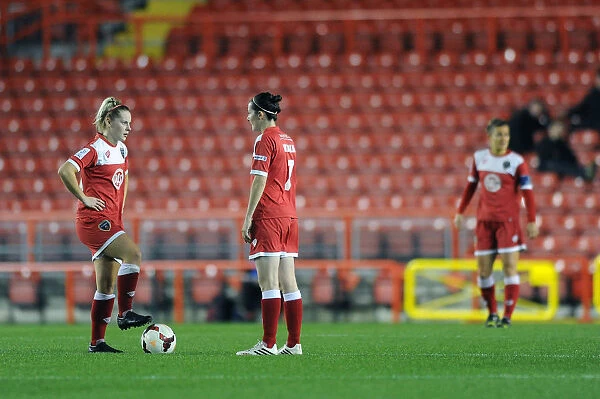 FC Barcelona Takes the Lead: Dejected Expressions from Natalia Pablos Sanchon and Nikki Watts of Bristol Academy WFC