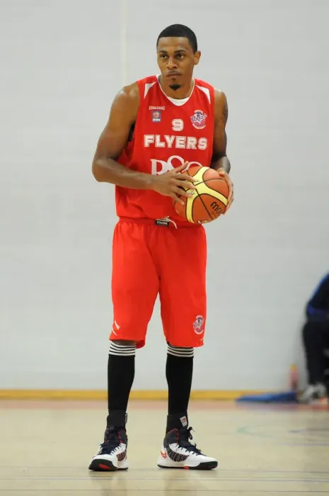 Framed Print : Fierce Showdown: British Basketball Cup - Flyers vs. Raiders
