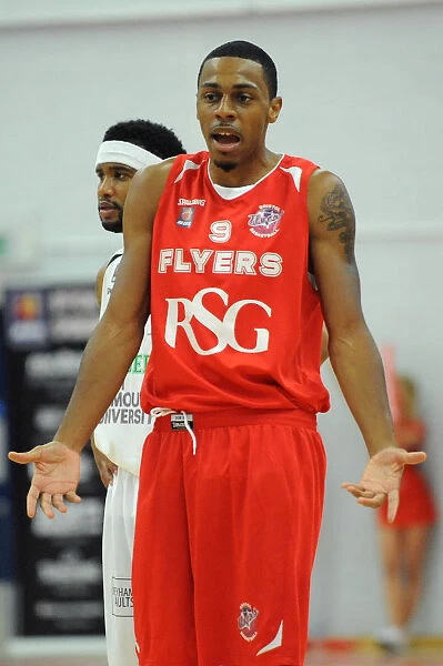 Fierce Showdown: Flyers vs. Raiders in the British Basketball Cup at Wise Campus