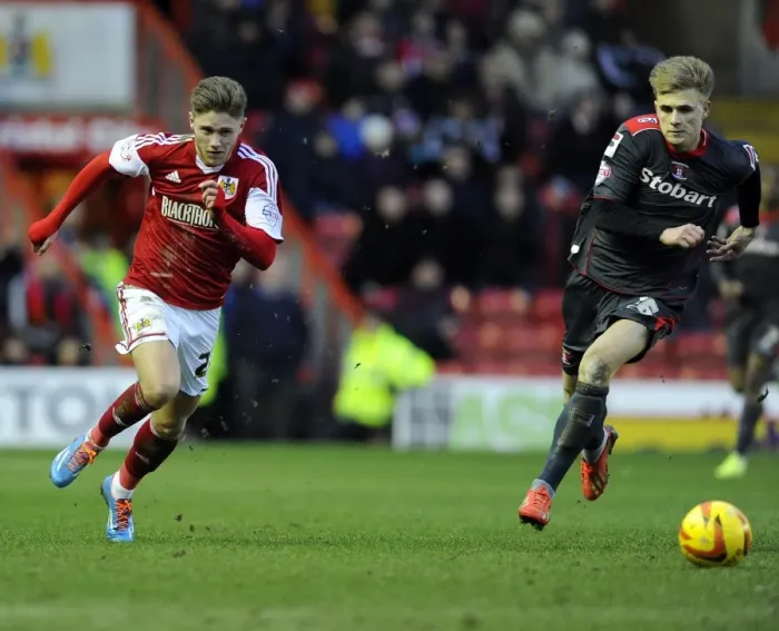 Framed Print : A Fight for Supremacy: Wes Burns vs Brad Potts, Intense Rivalry at Ashton Gate - Sky Bet League One (January 2014)
