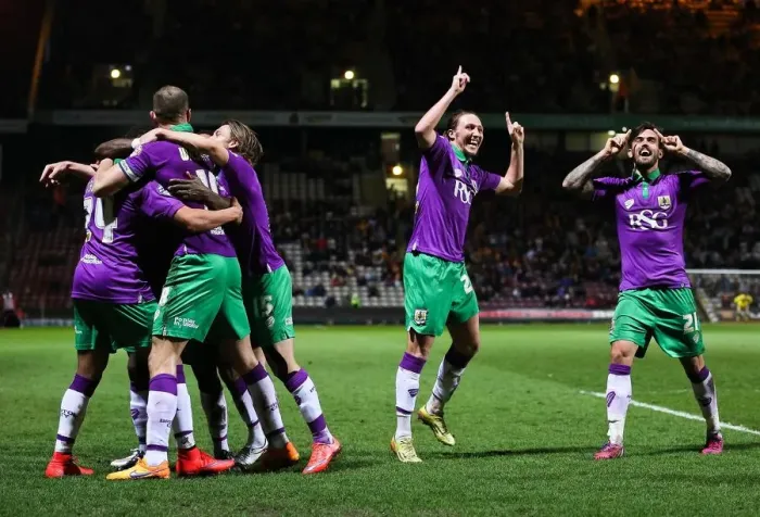 Framed Print : Five-Goal Blitz: Thrilling Celebration by Bristol City in Promotion-Sealing Victory over Bradford City