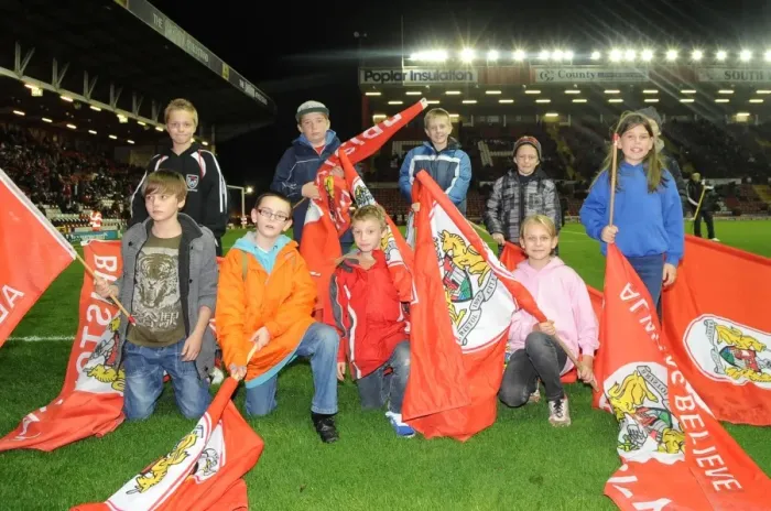Framed Print : Flag Bearers Leading Out Teams at Bristol City vs Brentford, Sky Bet League One (10-22-2013)
