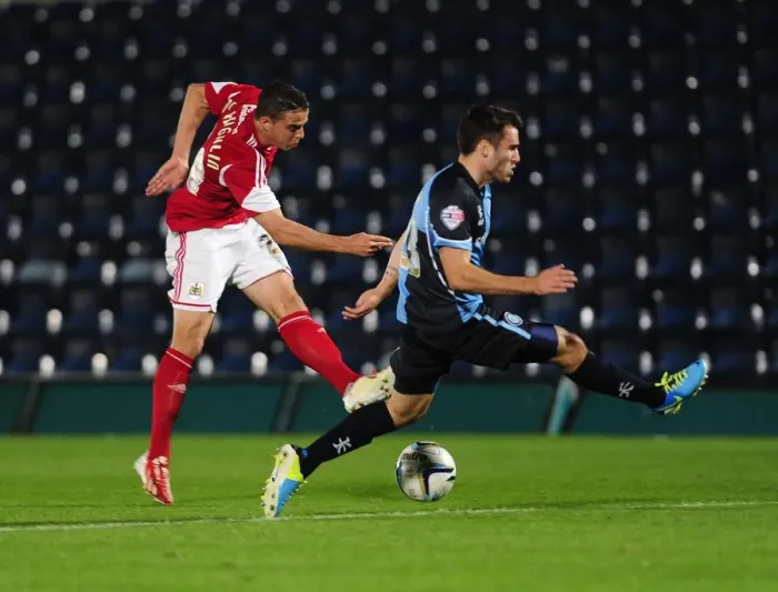 Framed Print : Football Rivalry: Bristol City vs Wycombe Wanderers in the Johnstone's Paint Trophy at Adams Park (October 8, 2013) Framed Print : Football Rivalry: Bristol City vs Wycombe Wanderers in the Johnstone's Paint Trophy at Adams Park (October 8, 2013)