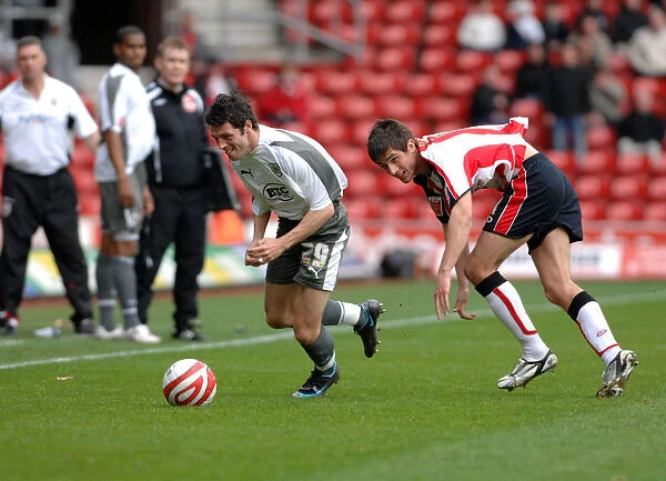 Football Rivalry: Ivan Sproule in Action - Southampton vs. Bristol City
