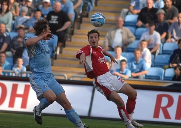 Football Rivalry: Ivan Sproule Fights it Out in the Coventry City vs. Bristol City Clash