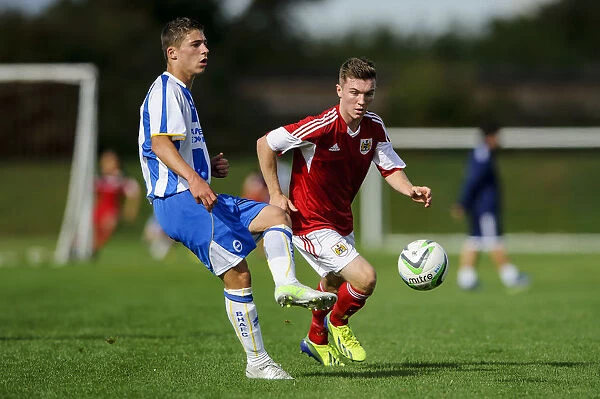 Football Rivalry: Jamie Horgan of Bristol City Faces Off Against Brighton & Hove Albion at SGS Wise Campus (October 2013)