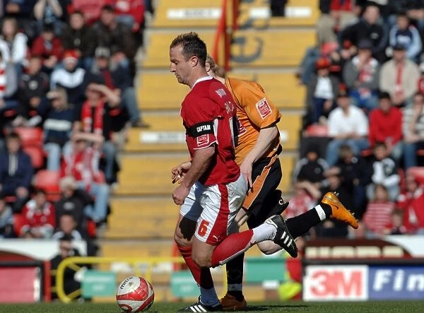 Football Rivalry: Louis Carey in Action - Bristol City vs. Wolverhampton Wanderers
