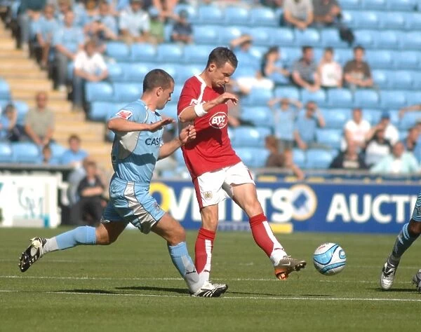 Football Rivalry: Michael McIndoe in Action - Coventry City vs. Bristol City