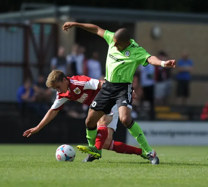 Framed Print : Forest Green Rovers Magno Viera Steals the Ball from Joe Bryan in Preseason Clash vs. Bristol City (2013)