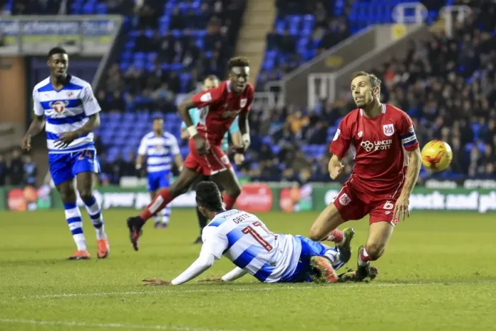 Framed Print : Gary O'Neil Tackled by Jordan Obita in Reading vs. Bristol City Championship Clash Framed Print : Gary O'Neil Tackled by Jordan Obita in Reading vs. Bristol City Championship Clash