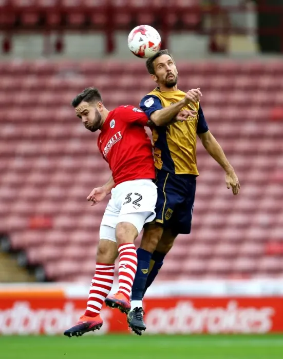 Framed Print : Gary O'Neil Wins Heading Duel Over Adam Armstrong in Barnsley vs. Bristol City Championship Clash