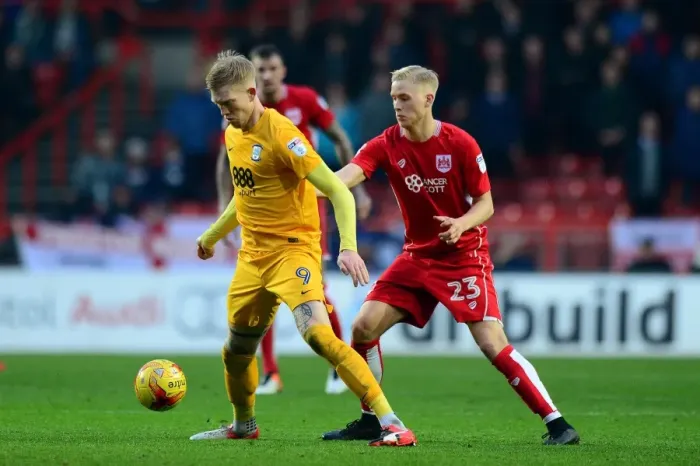 Framed Print : Hordur Magnusson Closes In: Intense Moment from Bristol City vs Preston North End