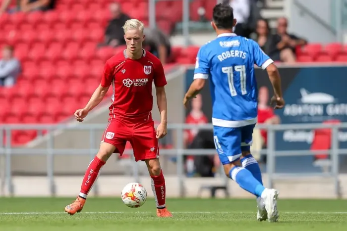 Framed Print : Hordur Magnusson vs Gary Roberts: Intense Clash at Ashton Gate - Bristol City vs Portsmouth Pre-Season Friendly Framed Print : Hordur Magnusson vs Gary Roberts: Intense Clash at Ashton Gate - Bristol City vs Portsmouth Pre-Season Friendly