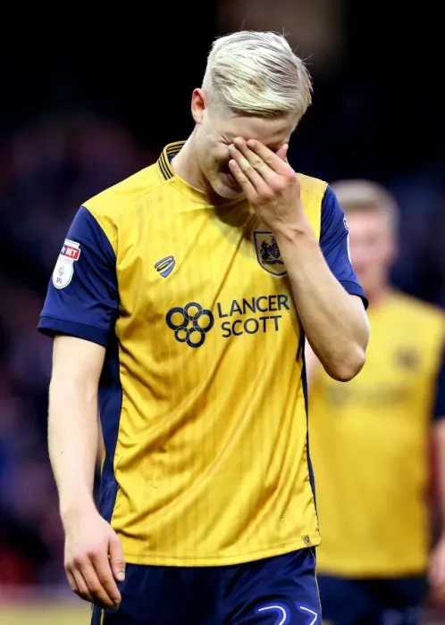 Framed Print : Hordur Magnusson's Disappointment: Barnsley Holds Bristol City in Championship Clash