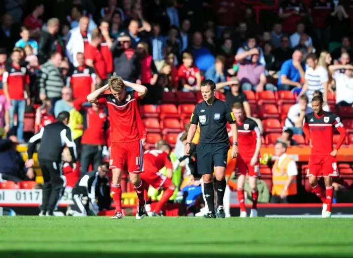 Framed Print : Horror Injury to Debutant Elokobi: Reactions from Players and Fans during Bristol City vs Leeds United (29.09.12) Framed Print : Horror Injury to Debutant Elokobi: Reactions from Players and Fans during Bristol City vs Leeds United (29.09.12)
