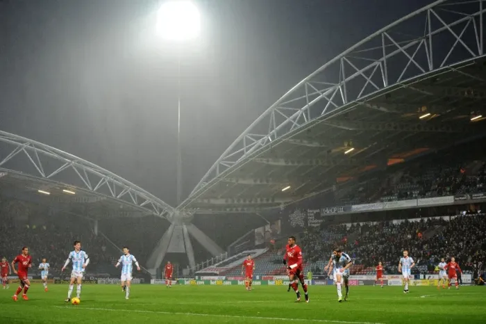 Framed Print : Huddersfield vs. Bristol City: A Rainy Championship Clash at John Smith's Stadium
