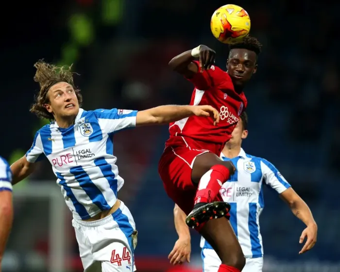 Framed Print : Huddersfield's Hefele Stops Abraham's Charge in Championship Clash