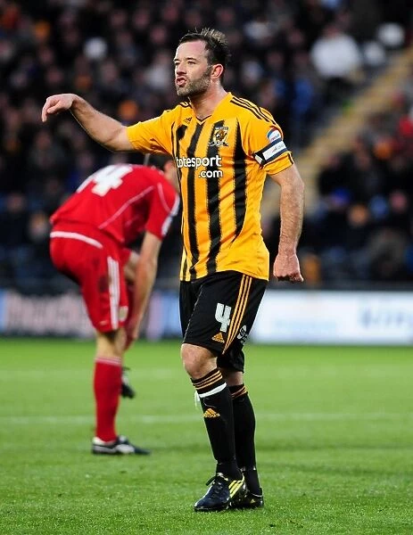 Ian Ashbee of Hull City Clashes with Opponents from Bristol City during the Championship Match, 18 / 12 / 2010