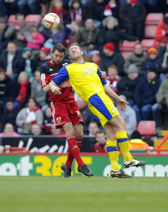 Framed Print : Intense Aerial Battle: Cole Skuse vs Steve Howard - Football Rivalry at Ashton Gate, 2013 Framed Print : Intense Aerial Battle: Cole Skuse vs Steve Howard - Football Rivalry at Ashton Gate, 2013
