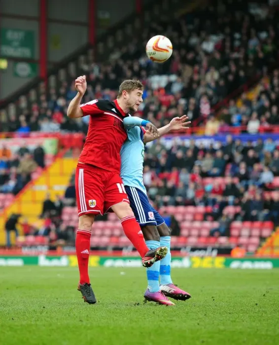Framed Print : Intense Aerial Battle: Davies vs Emnes - Championship Football Rivalry