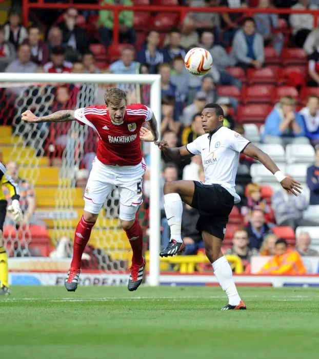 Framed Print : Intense Aerial Battle: Flint vs Assombalonga - Football Rivalry in the Sky