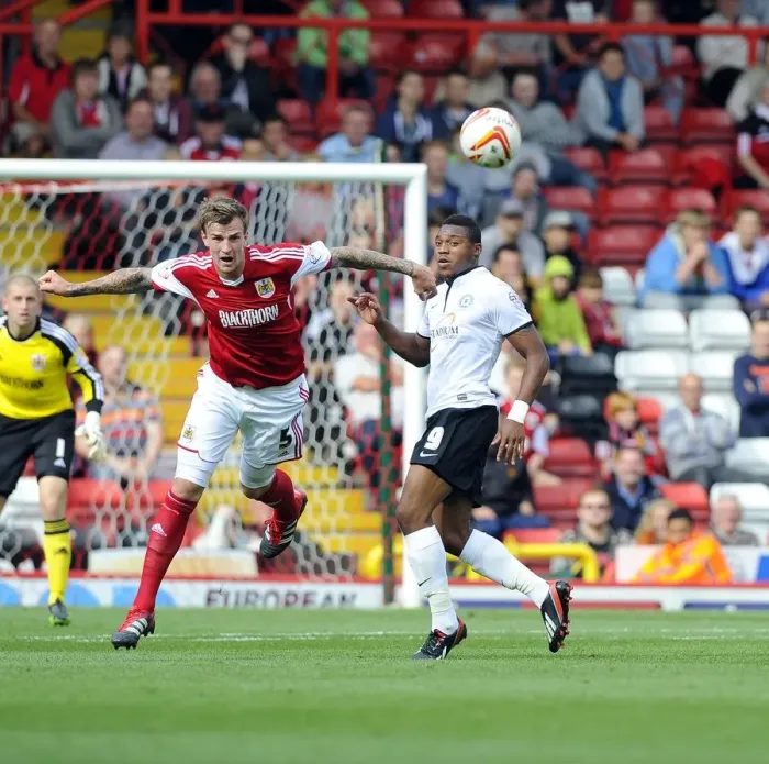 Framed Print : Intense Aerial Battle: Flint vs Assombalonga - Football Rivalry in the Sky (Bristol City vs Peterborough) Framed Print : Intense Aerial Battle: Flint vs Assombalonga - Football Rivalry in the Sky (Bristol City vs Peterborough)