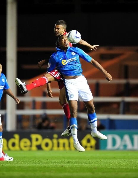 Intense Aerial Battle: Liam Fontaine vs. Tyrone Barnett, Peterborough United vs. Bristol City Championship Match