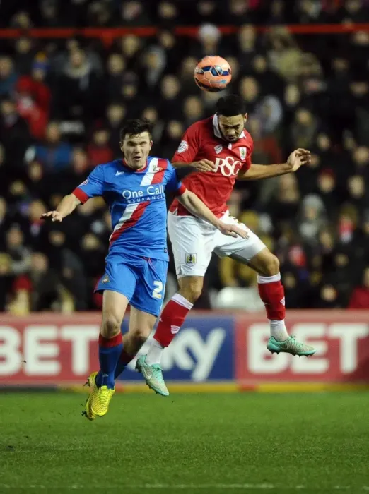 Framed Print : Intense Aerial Clash: Derrick Williams vs. Harry Middleton at Ashton Gate