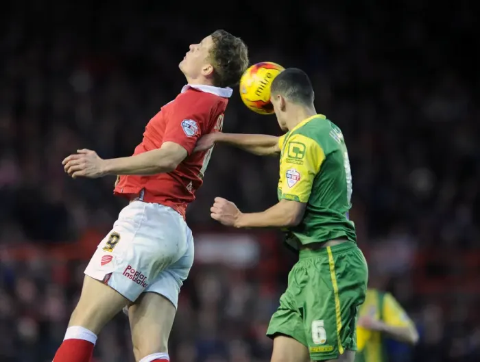 Framed Print : Intense Aerial Clash: Matt Smith vs. Haydn Hollis, Bristol City vs. Notts County