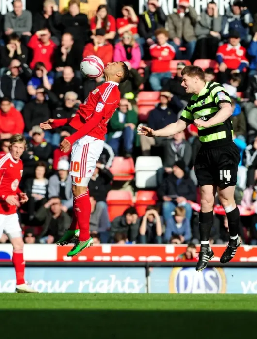Framed Print : Intense Aerial Clash: Maynard vs. Nelson at Ashton Gate, Bristol City vs. Scunthorpe United, Championship 2010 Framed Print : Intense Aerial Clash: Maynard vs. Nelson at Ashton Gate, Bristol City vs. Scunthorpe United, Championship 2010