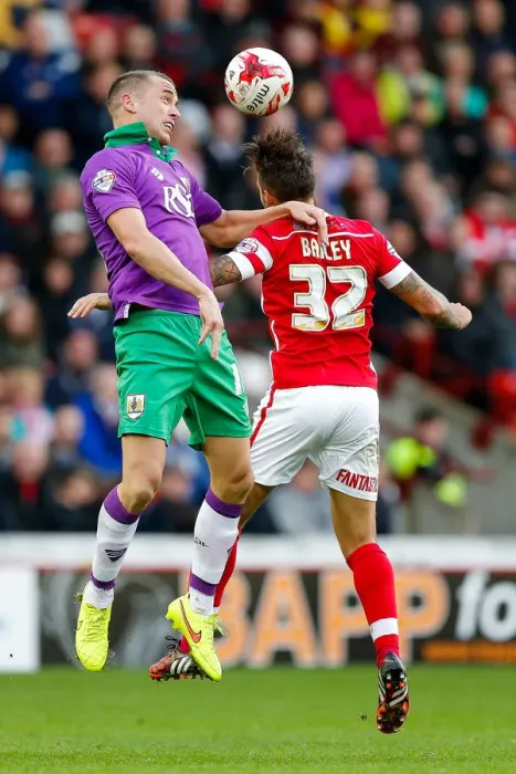 Framed Print : Intense Aerial Clash: Wilbraham vs Bailey at Barnsley's Oakwell Stadium Framed Print : Intense Aerial Clash: Wilbraham vs Bailey at Barnsley's Oakwell Stadium