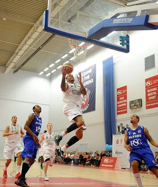 Intense Basketball Clash: Bristol Flyers vs. Plymouth Raiders at SGS Wise Campus - September 2014