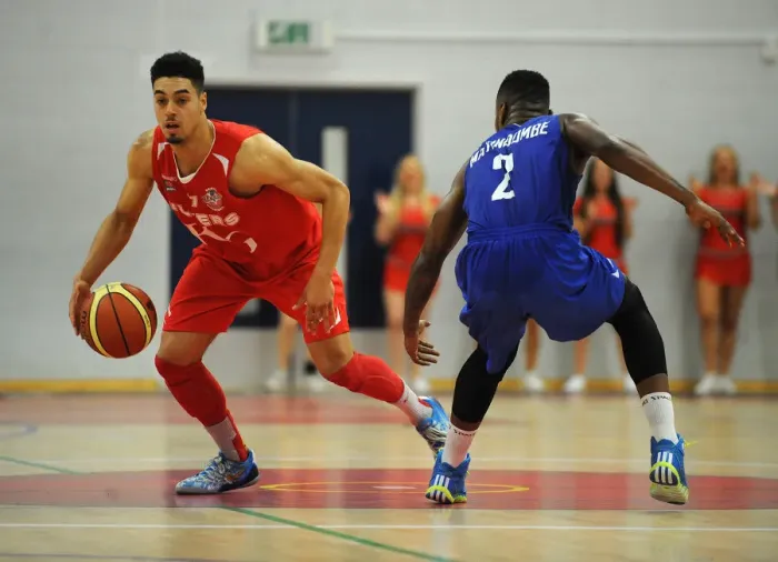 Framed Print : Intense Basketball Showdown: Bristol Flyers vs. Durham Wildcats at SGS Wise Campus