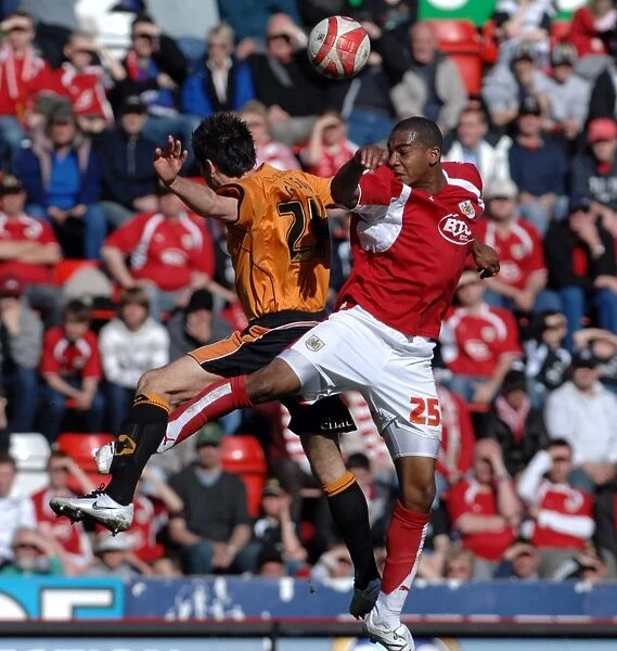 Intense Battle: Marvin Elliott Fights for Possession against Wolverhampton Wanderers